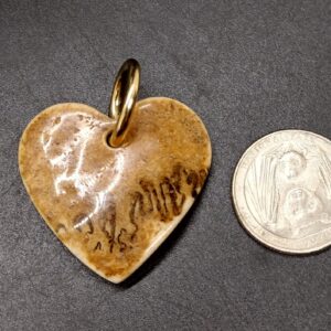 Human Skull Heart Pendant with Lambdoid suture